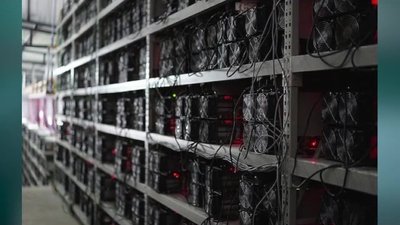 A high-capacity mining farm hosting hundreds of Bitcoin mining rigs in a temperature-controlled environment